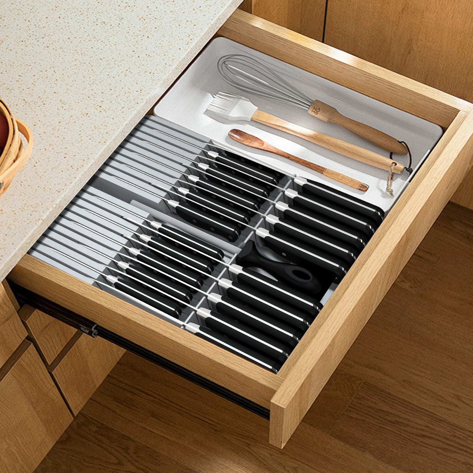 Drawer knife block placed inside an open kitchen drawer