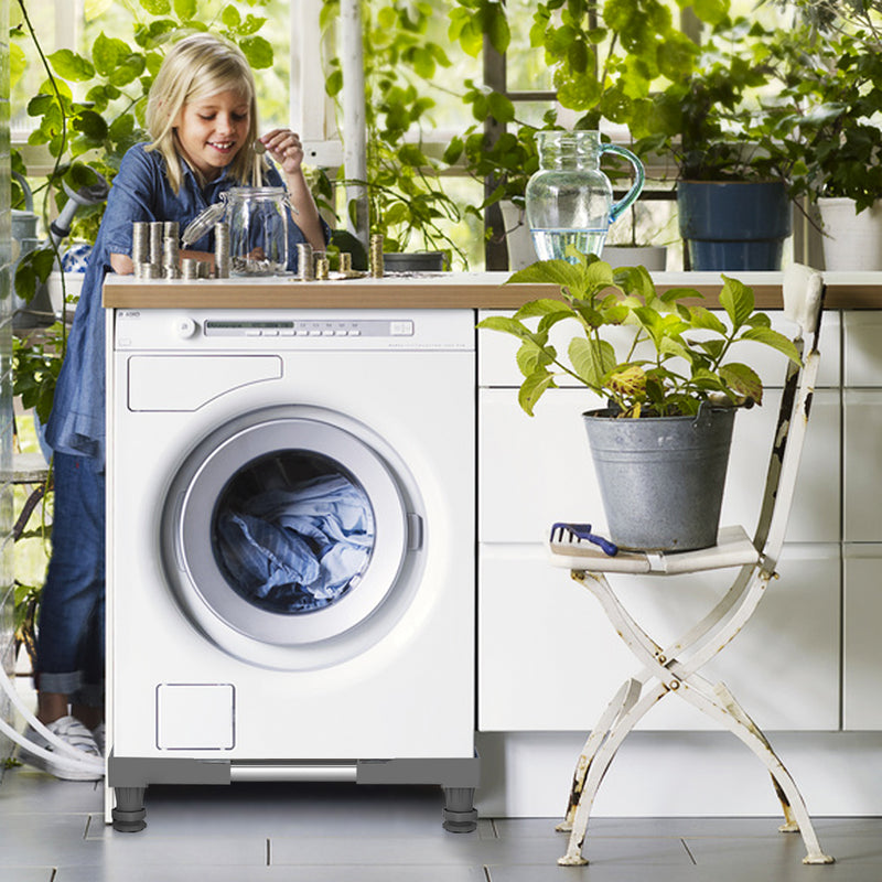 Side view of washing machine elevated on the adjustable holder